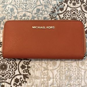 Orange gently used wallet